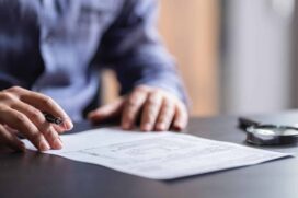Stock Man Filling In The Tax Form