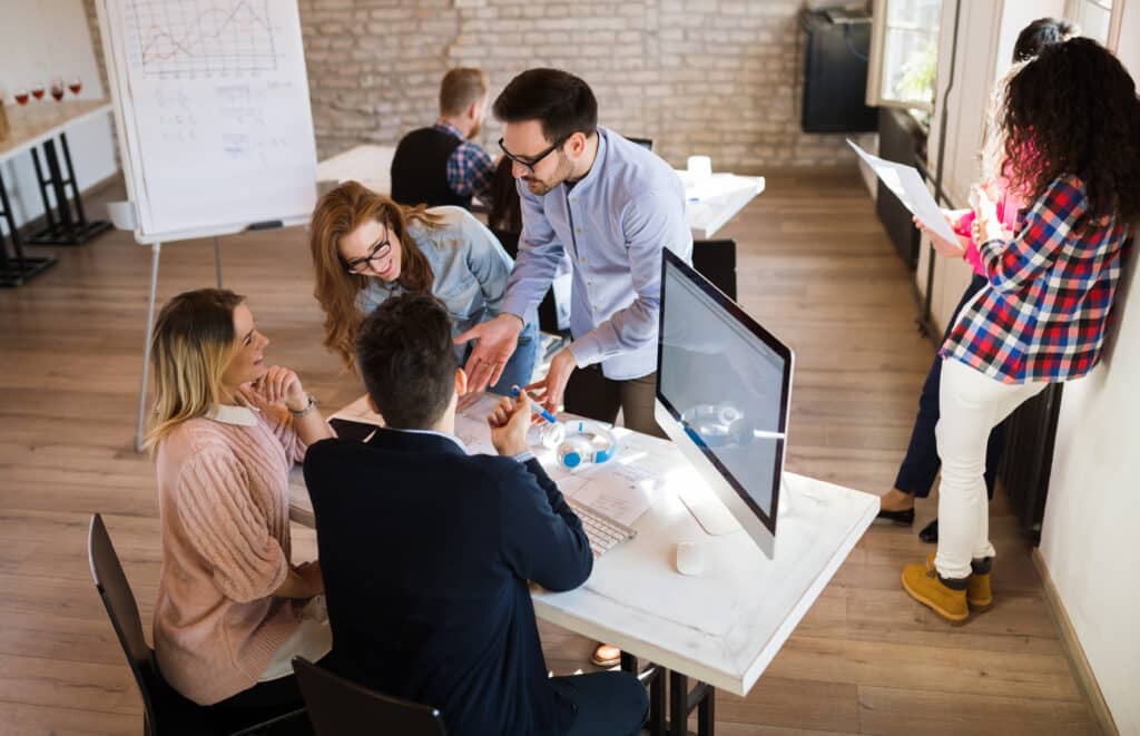 Picture of young architects discussing in office