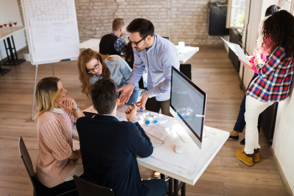 Picture of young architects discussing in office