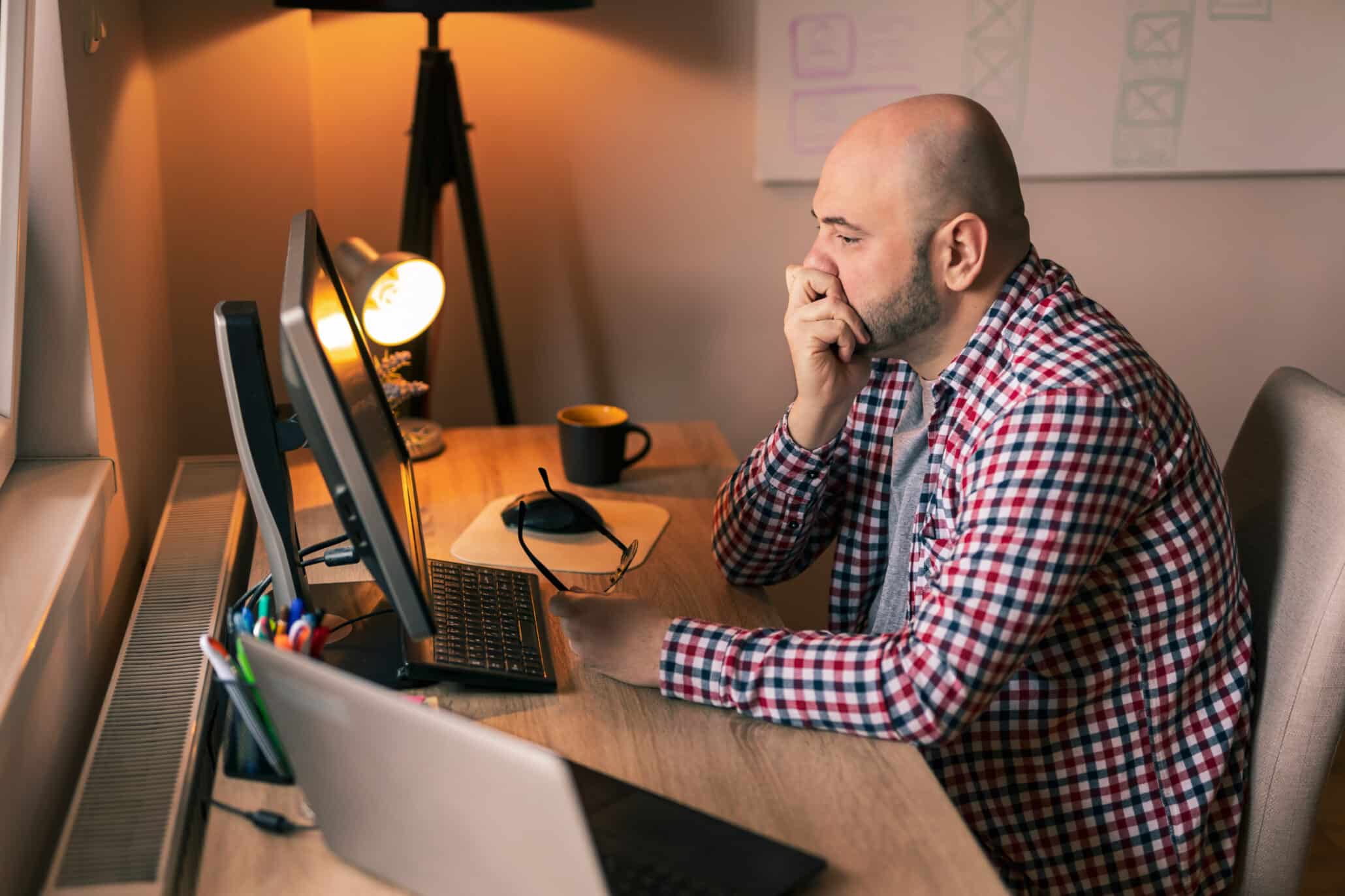 Web designer stressed out while working long hours